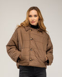 Chaqueta corta oversize, reversible,  impermeable y con capucha desmontable