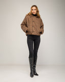 Chaqueta corta oversize, reversible,  impermeable y con capucha desmontable