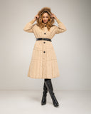 Long padded coat with zip fastening and faux fur hood