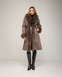 Long faux fur coat with fur trim and short fur lining, side pockets and belt