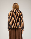 Chaqueta de pelo sintético tricolor reversible con estampado zig-zag
