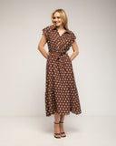 Vestido midi de lunares con botones en la parte de arriba, falda de vuelo y cinturón - Tantra Spain
