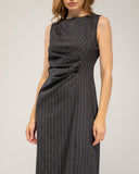 Sleeveless pinstripe midi dress, with a pleat on one side and a slit at the bottom