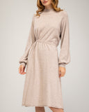 Oversized fine knit dress with a high neck, fitted at the front waist, and elastic cuffs