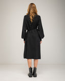 Oversized fine knit dress with a high neck, fitted at the front waist, and elastic cuffs
