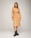 Oversized fine knit dress with a high neck, fitted at the front waist, and elastic cuffs