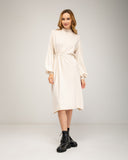 Oversized fine knit dress with a high neck, fitted at the front waist, and elastic cuffs