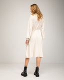 Oversized fine knit dress with a high neck, fitted at the front waist, and elastic cuffs