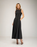 Vestido midi de corte tipo A con vuelo, con pinzas, bolsillos y cierre de cremallera en la espalda.