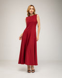 Vestido midi de corte tipo A con vuelo, con pinzas, bolsillos y cierre de cremallera en la espalda.