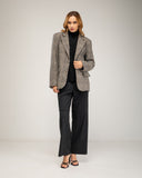 Oversized wool jacket with Prince of Wales print and faux pockets