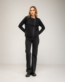 Chaqueta de punto fino con cremallera lateral, cuello pico y falsos bolsillos