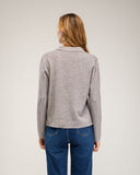 Chaqueta de punto fino con cremallera lateral, cuello pico y falsos bolsillos