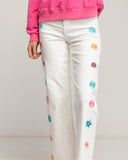 Straight-cut denim trousers with floral embroidery on the front