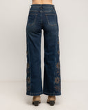 Jeans de tiro alto con bordado de flores en los laterales - Tantra Spain
