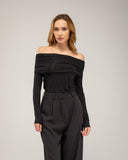 High-waisted straight-leg dress pants, with pleats and side pockets. Faux back pocket