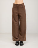 Straight-leg dress pants with a wide hem, side pockets, and faux back pockets