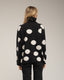 Jersey amplio de lunares con cuello alto