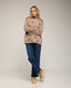 Jersey amplio de lunares con cuello alto