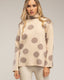 Jersey amplio de lunares con cuello alto