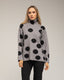 Jersey amplio de lunares con cuello alto