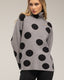 Jersey amplio de lunares con cuello alto