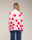 Jersey amplio de lunares con cuello alto