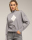 Jersey de punto con rombo y detalles de strass y cuello perkins