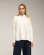 Jersey oversize con textura de rayas y cuadros.