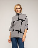 Jersey de punto fino estampado geometrico con manga francesa y detalle de boton - Tantra Spain