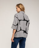 Jersey de punto fino estampado geometrico con manga francesa y detalle de boton - Tantra Spain