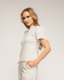 Jersey de punto fino con pliegues en los hombros  y cuello con apertura con boton - Tantra Spain