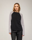 Jesey de punto fino bicolor con cuello redondo, oversize y manga larga