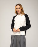Jesey de punto fino bicolor con cuello redondo, oversize y manga larga