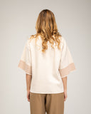 Jersey de punto fino oversize con manga francesa y detalle de rayas en la manga