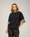 Oversized fine-knit sweater with half sleeves and stripe detail on the sleeve