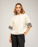 Oversized fine-knit sweater with half sleeves and stripe detail on the sleeve