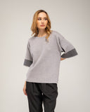 Jersey de punto fino oversize con manga francesa y detalle de rayas en la manga