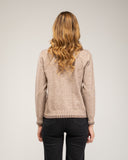 Fine-knit sweater with a crew neck and topstitching at the neck, cuffs, and hem
