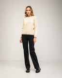 Fine-knit sweater with a crew neck and topstitching at the neck, cuffs, and hem