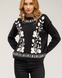 Jersey de punto con cuello redondo y flores bordadas en el pecho, cuello y bajo
