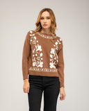 Knitted sweater with a crew neck and embroidered flowers on the chest, neckline and hem