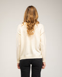 Knitted sweater with a crew neck and embroidered flowers on the chest, neckline and hem