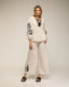 Set de pantalon y top con bordados en las mangas, cuello y en el bajo del pantalon