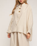 Set de pantalón con cintura elástica y camisa de manga murciélago, estilo oversize con botones dorados - Tantra Spain
