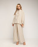Set de pantalón con cintura elástica y camisa de manga murciélago, estilo oversize con botones dorados - Tantra Spain
