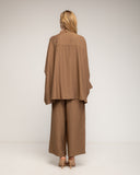 Set de pantalón con cintura elástica y camisa de manga murciélago, estilo oversize con botones dorados - Tantra Spain