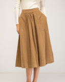 Micropuff midi skirt with front pockets and elastic at the back