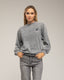 Sudadera efecto desgastado con detallles de strass.