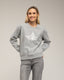 Sudadera con dibujo de estrella con lentejuelas y textura.
